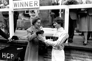 Jockey Walter Swinburn receives a winners trophy at Gosforth Park Racecourse, Newcastle Jockey Walter Swinburn receives a winners trophy at Gosforth Park Racecourse, Newcastle