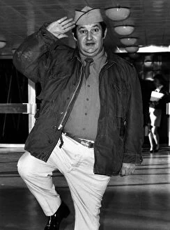 Images Dated 26th November 1973: Joe Baker comedian 1973 Comedian Joe Bakerleft Heathrow Airport for Tel Aviv where