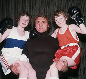 Joe Bugner boxer lifting up children December 1975 Joe Bugner boxer lifting up children December 1975