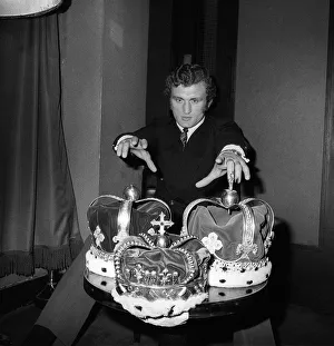 Joe Bugner reaches for Henry Coopers three crowns having signed to fight Henry at Wembley Joe Bugner reaches for Henry Coopers three crowns having signed to fight Henry at Wembley