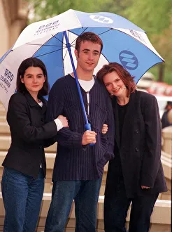 Joe McFadden with Shirley Henderson and Sharon Small standing under BBC umbrella Joe McFadden with Shirley Henderson and Sharon Small standing under BBC umbrella