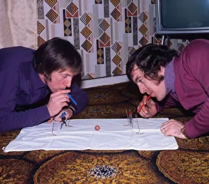John Brownlie of Hibernian and Dixie Deans of Celtic playing blow football December 1972 John Brownlie of Hibernian and Dixie Deans of Celtic playing blow football December 1972