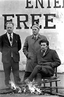 John Hume sits by fire in an early morning demonstration. February 1972 72-1641 John Hume sits by fire in an early morning demonstration. February 1972 72-1641