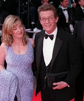 Images Dated 1st May 1997: JOHN HURT & GUEST AT THE CANNES FILM FESTIVAL MAY 1997