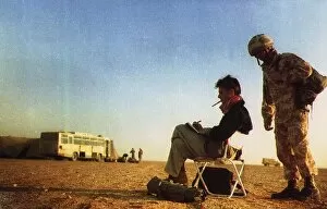 Images Dated 23rd February 1991: John Kean Official British war artist sketching in the desert on the Saudi border at