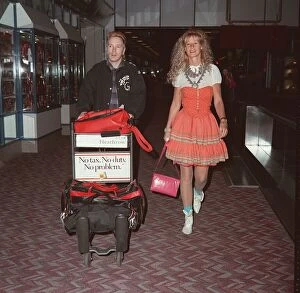Images Dated 1st May 1990: John Lydon singer of Public Image and wife Nora at London Airport, May 1990