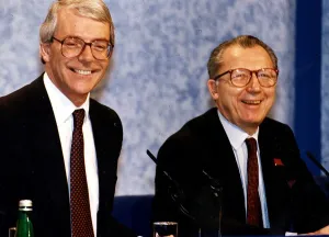 John Major Prime Minister at European Summit press conference shares a joke with Jacques John Major Prime Minister at European Summit press conference shares a joke with Jacques