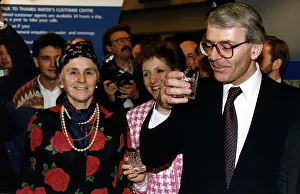 John Major Prime Minister holding a glass of water at the Ideal Home Exhibition in London John Major Prime Minister holding a glass of water at the Ideal Home Exhibition in London