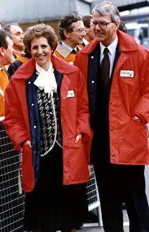 John Major Prime Minister and wife Norma in orange jackets at Charterail Goods yard in John Major Prime Minister and wife Norma in orange jackets at Charterail Goods yard in
