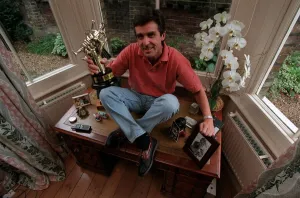 John Stapleton TV Presenter September 1998 At home sitting on his desk John Stapleton TV Presenter September 1998 At home sitting on his desk