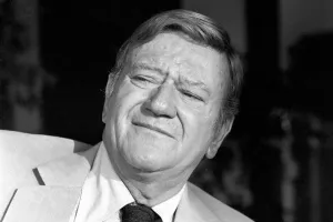 John Wayne who stars in Brannigan seen here at home in Texas John Wayne who stars in Brannigan seen here at home in Texas