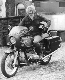 Jon Pertwee actor sitting on BMW motor cycle - April 1977 18/04/1977 Jon Pertwee actor sitting on BMW motor cycle - April 1977 18/04/1977