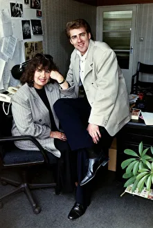Jonathan Ross TV Presenter sitting on desk with his mother Maureen Jonathan Ross TV Presenter sitting on desk with his mother Maureen