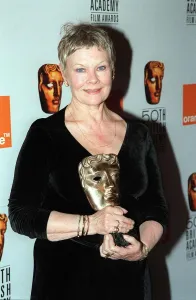 Judi Dench April 1998 pictured holding BAFTA Award Judi Dench April 1998 pictured holding BAFTA Award