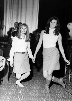 Julie Christie and Raquel Welch practice curtsying 1966 Julie Christie and Raquel Welch practice curtsying 1966
