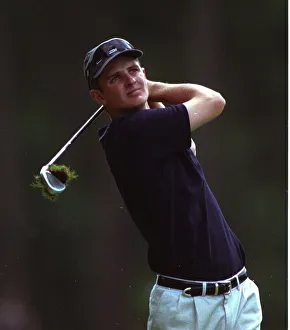 Justin Rose plays a shot from the the rough on the 14th at the Dutch Open Golf Justin Rose plays a shot from the the rough on the 14th at the Dutch Open Golf