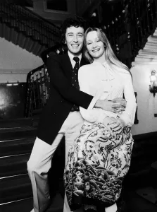 Karen Dotrice Actress and Robert Powell Actor sitting on bannister rail at the bottom of Karen Dotrice Actress and Robert Powell Actor sitting on bannister rail at the bottom of