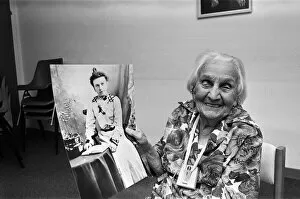 Images Dated 27th September 1978: Kate Willison celebrates her 100th birthday. She is holding a picture of herself in her