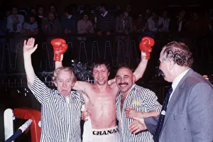 Ken Buchanan boxer arms raised after win with seconds in ring Ken Buchanan boxer arms raised after win with seconds in ring