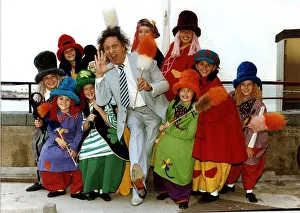 Ken Dodd comedian stands with diddy men and tickling sticks Dbase A©Mirrorpix Ken Dodd comedian stands with diddy men and tickling sticks Dbase A©Mirrorpix
