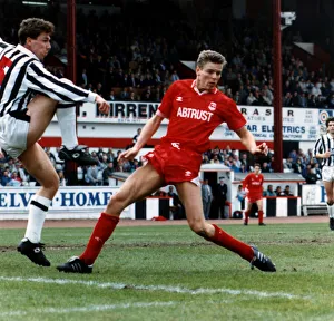 Kevin McGowne football player for St Mirren defends goal from Willem van der Ark of Kevin McGowne football player for St Mirren defends goal from Willem van der Ark of