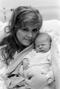 Kirsty MacColl - Feb 1985 and her newly born baby Kirsty MacColl - Feb 1985 and her newly born baby