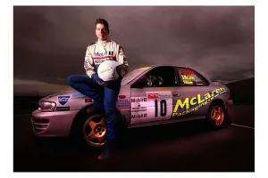 Knockhill race course rally driver May 1998 sits on car holding helmet Knockhill race course rally driver May 1998 sits on car holding helmet