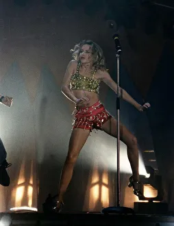 Kylie Minogue at her concert were she is dancing to the music Kylie Minogue at her concert were she is dancing to the music