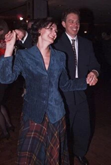 Images Dated 3rd October 1995: Labour leader Tony Blair and wife Cherie Blair dance together at the party