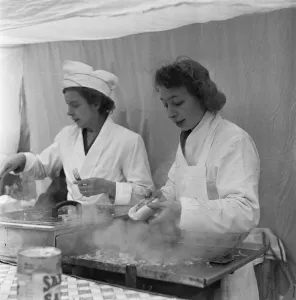 Ladies of a catering stall at the Flea market in Club Row, Bethnal Green Ladies of a catering stall at the Flea market in Club Row, Bethnal Green