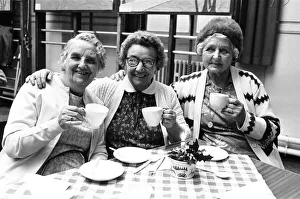Three ladies seen here enjoying a nice cup of tea after their Christmas party Three ladies seen here enjoying a nice cup of tea after their Christmas party