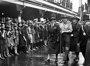Lady Baden Powell inspects the Guard of Honour before departing with the Chief Scout Lady Baden Powell inspects the Guard of Honour before departing with the Chief Scout