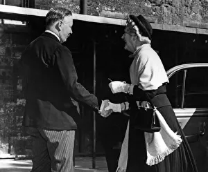 Lady Churchill greeted by the Duke of Norfolk on her arrival at Westminster Abbey for a Lady Churchill greeted by the Duke of Norfolk on her arrival at Westminster Abbey for a