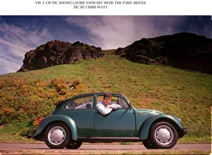 Laurie Stewart with P registration Volkswagen Beetle leaning out of car Laurie Stewart with P registration Volkswagen Beetle leaning out of car