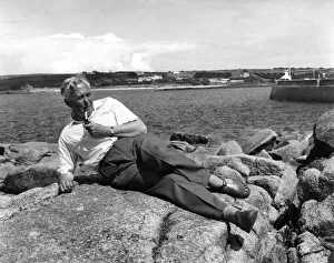 Leader of the Labour Party Harold Wilson, relaxes on the rocks at St Leader of the Labour Party Harold Wilson, relaxes on the rocks at St