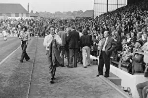 Images Dated 21st August 1974: Leeds Manager Brian Clough seen here walking to the dug out at the start of the game