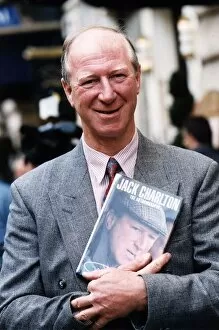 Images Dated 30th October 1996: Former Leeds United and England footballer Jack Charlton holding his autobiography