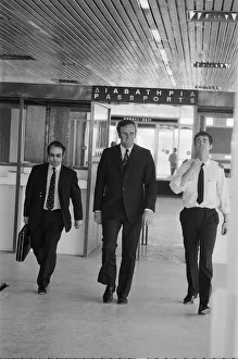 Leeds United manager Don Revie goes through passport control in Greece as the team return Leeds United manager Don Revie goes through passport control in Greece as the team return