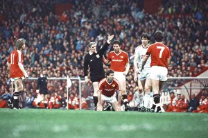 Left to right, Jesper Olsen, the referee, Brian McClair (on the floor) Left to right, Jesper Olsen, the referee, Brian McClair (on the floor)