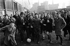 Leicester town folk play football before the 1961 FA Cup Final between Leicester City Leicester town folk play football before the 1961 FA Cup Final between Leicester City