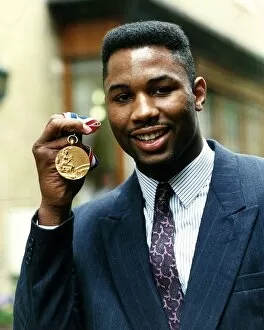 Images Dated 24th April 1989: Lennox Lewis boxer holding gold medal April 1989