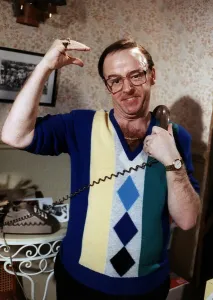 Les Dennis Comedian and TV presenter in one of his many roles dressed in v neck pullover Les Dennis Comedian and TV presenter in one of his many roles dressed in v neck pullover