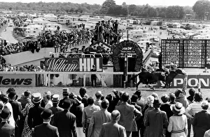 Lester Piggott jockey on The Minstrel winning the Derby in front of Hot Grove at Lester Piggott jockey on The Minstrel winning the Derby in front of Hot Grove at