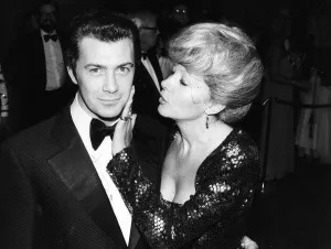 Lewis Collins Actor has his face caressed by Ingrid Pitt at the premiere of his film ' Lewis Collins Actor has his face caressed by Ingrid Pitt at the premiere of his film '