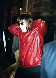 Liam Gallagher of Oasis at the Edinburgh Festival wearing a red leather jacket Liam Gallagher of Oasis at the Edinburgh Festival wearing a red leather jacket