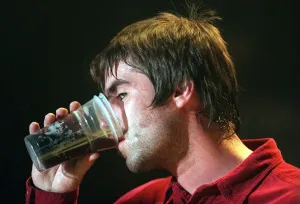 Liam Gallagher Oasis pop group December 1997 Drining beer from glass SECC Glasgow Liam Gallagher Oasis pop group December 1997 Drining beer from glass SECC Glasgow