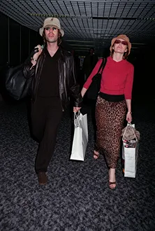 Liam Gallagher Singer July 98 Arriving at heathrow airport with his wife actress Liam Gallagher Singer July 98 Arriving at heathrow airport with his wife actress