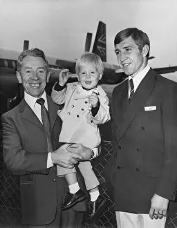 Images Dated 6th July 1974: Lightweight boxer Ken Buchanan seen here being met by his father