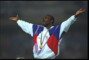 Linford Christie of Great Britain acknowledges the cheers of the crowd during the medal Linford Christie of Great Britain acknowledges the cheers of the crowd during the medal