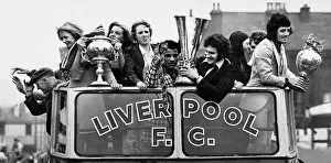 Liverpool celebrate their title win with an open top bus parade through the city centre Liverpool celebrate their title win with an open top bus parade through the city centre